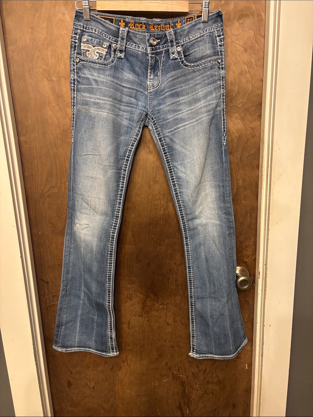 Rock Revival woman’s Light Blue Faded Bootcut Jeans